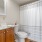bathroom with a large mirror